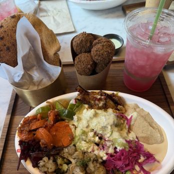 Elite Week: Brassica - Salad with chicken, hummus, and veggies, a side of falafel , pita and a pink mint lemonade - Yelp Events Near Me - Houston, Texas