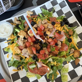 Whiskey Pie - a plate of salad with a fork in it - Pizza Near Me - Madras, Oregon Whiskey Pie - a plate of salad with a fork in it - Pizza Near Me - Madras, Oregon
