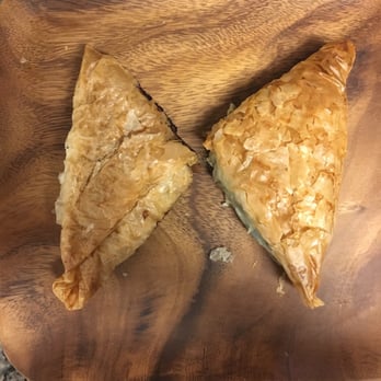 Poseidon Bakery - left:meat pie right: spinach pie. - Bakeries Near Me - New York, New York Poseidon Bakery - left:meat pie right: spinach pie. - Bakeries Near Me - New York, New York