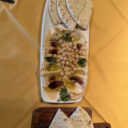 Whole Chickpea Hummus, Light & Airy Warm Pita, Olive Oil and Fresh Herbs