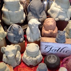 The West Wind - Buddha critter statues, printed rock and hand made silk scarfs.