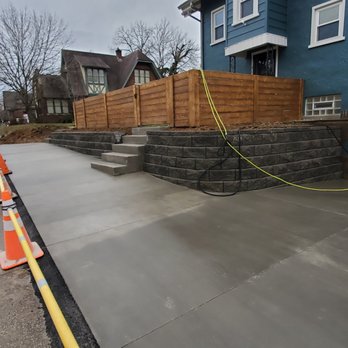 Goodman Concrete - New concrete driveway 2 sets of steps and retaining wall - Masonry/Concrete Near Me - Louisville, Kentucky Goodman Concrete - New concrete driveway 2 sets of steps and retaining wall - Masonry/Concrete Near Me - Louisville, Kentucky