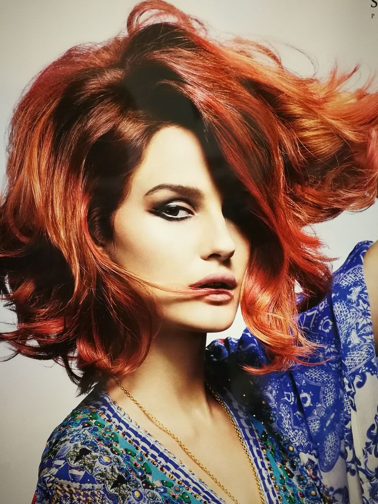 Rita's Hair Design Logo