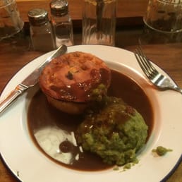 Beef and kidney pie with mushy peas