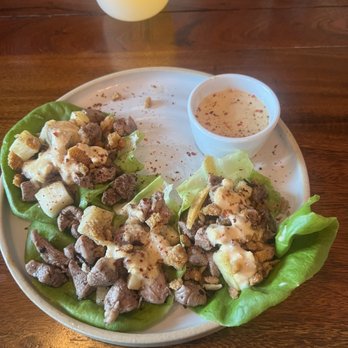 Hen House - Duck Confit Lettuce wraps with duck, pineapple, garlic and ginger seasoning and soy sauce - Wine Bars Near Me - Memphis, Tennessee Hen House - Duck Confit Lettuce wraps with duck, pineapple, garlic and ginger seasoning and soy sauce - Wine Bars Near Me - Memphis, Tennessee