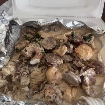 Bobobs - Left, Blackened fish and shrimp. Right, The Overload, all served over white rice. - Southern Near Me - Houston, Texas Bobobs - Left, Blackened fish and shrimp. Right, The Overload, all served over white rice. - Southern Near Me - Houston, Texas