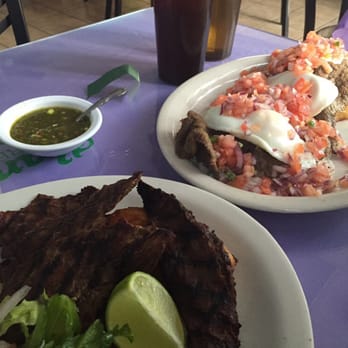 Kantutas Restaurant - Large silpacho in the back. 13$. Thin battered fried beef with eggs and pico de gallo on top. - Latin American Near Me - Silver Spring, Maryland
