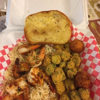 The Catch - Grilled shrimp on bed of rice, fried okra, hush puppies, garlic bread - Cajun/Creole Near Me - Garland, Texas The Catch - Grilled shrimp on bed of rice, fried okra, hush puppies, garlic bread - Cajun/Creole Near Me - Garland, Texas