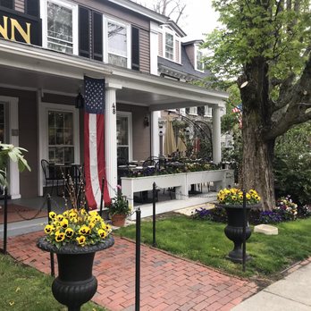 Concord's Colonial Inn - The Colonial Inn entrance, pretty in spring bloom. - Hotels Near Me - Concord, Massachusetts