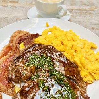 Toast Kitchen & Bar - Ribeye steak with eggs and side bacon - Breakfast & Brunch Near Me - Brea, California Toast Kitchen & Bar - Ribeye steak with eggs and side bacon - Breakfast & Brunch Near Me - Brea, California