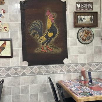 Chicken Annie's - Wall picture of their many chicken decorations - Chicken Wings Near Me - Girard, Kansas Chicken Annie's - Wall picture of their many chicken decorations - Chicken Wings Near Me - Girard, Kansas