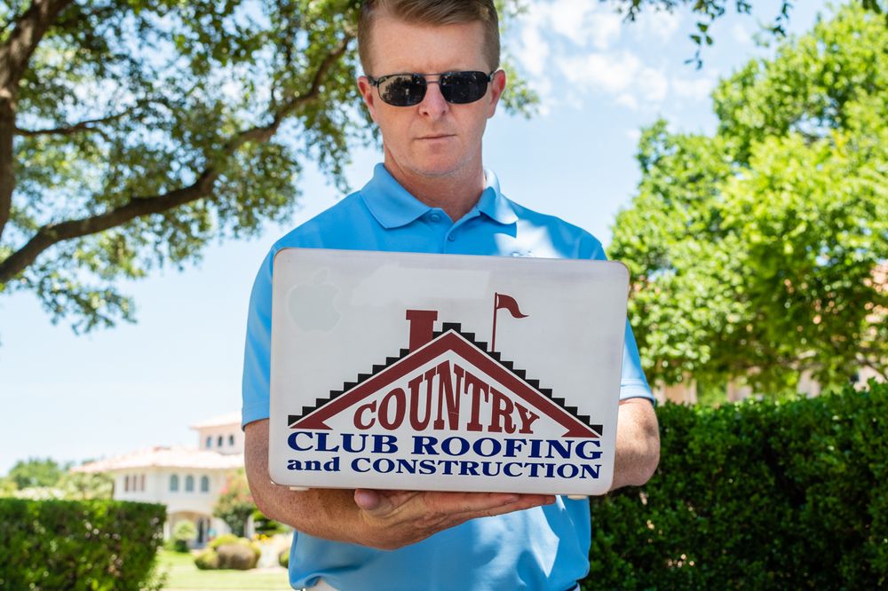 Slide of Country Club Roofing & Construction