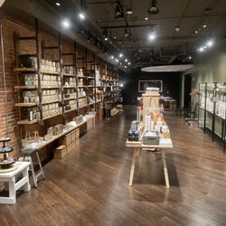 Kalamazoo Candle - Gorgeous shelving and DIY workshop in the back of the room