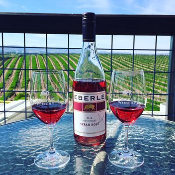 Eberle Winery - Their Rosé, on the patio, overlooking their vineyard. - Wineries Near Me - Paso Robles, California Eberle Winery - Their Rosé, on the patio, overlooking their vineyard. - Wineries Near Me - Paso Robles, California