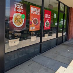 Flame Broiler - Posters on the windows