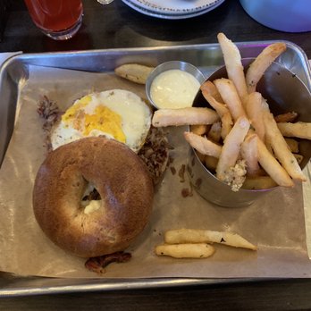 The Oakmont - Brisket and Egg Bagel with truffle fries - American Near Me - Indianapolis, Indiana The Oakmont - Brisket and Egg Bagel with truffle fries - American Near Me - Indianapolis, Indiana