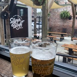 Window seat overlooking the beer garden. Needlerush Hefeweizen on the left, and the Piercing Point Juicy Pale Ale on the right. Window seat overlooking the beer garden. Needlerush Hefeweizen on the left, and the Piercing Point Juicy Pale Ale on the right.