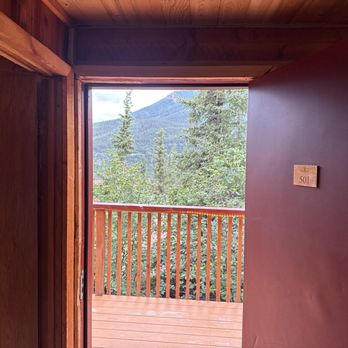 Denali Crow's Nest Log Cabins - Looking out the front door of room, number two, the grizzly bear King - Hotels Near Me - Preserve, Alaska