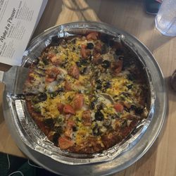 Monicals Pizza - Good eating location, waitress friendly, family oriented. Ordered a veggie, gluten free pizza. Really good. 5 stars in my book.