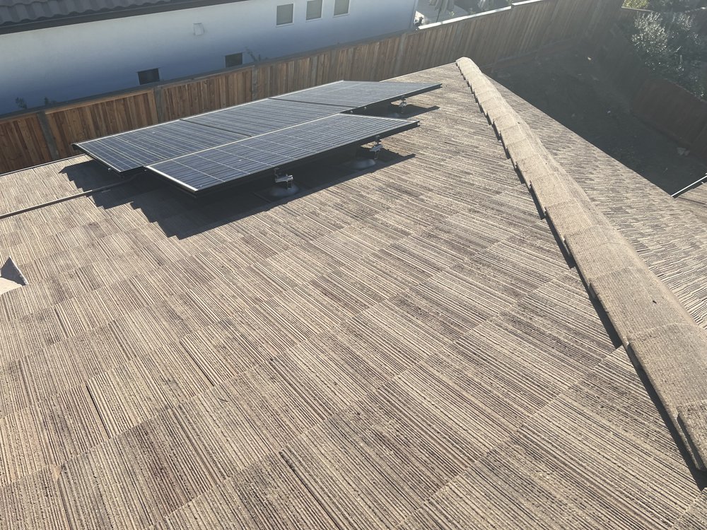 Slide of Del Rio's Roofing