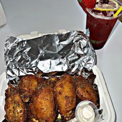 The Ice Storm - Lemon pepper wings and blackberry lemonade.