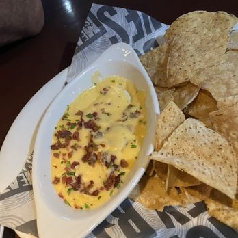 Smokey Bones - Chips and queso - Barbeque Near Me - Orlando, Florida Smokey Bones - Chips and queso - Barbeque Near Me - Orlando, Florida