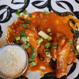 Wings drowned in basic jar sauce. The ranch is mayonnaise with specs Wings drowned in basic jar sauce. The ranch is mayonnaise with specs