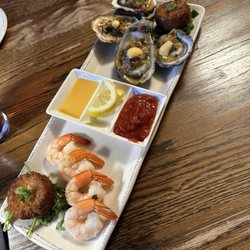 The Best Cellar - Jumbo shrimp cocktail, crab cakes, and oysters Rockefeller
