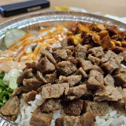 Combo bowl with gyro, chicken, rice and salad. Combo bowl with gyro, chicken, rice and salad.