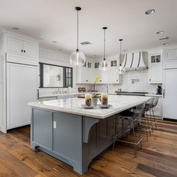 Jay Remodeling - a kitchen with a large island - General Contractors Near Me