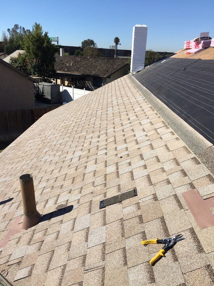 Slide of Thompson Roofing