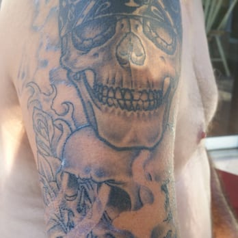 Lucky Devil Tattoo Parlor - Two skulls on the bottom black and grey. - Tattoo Near Me - Edgewater, Florida