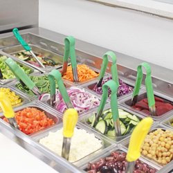 Santorini's - Unlimited toppings included with any Build Your Own Pita or Bowl including feta cheese and olives!  -Always fresh