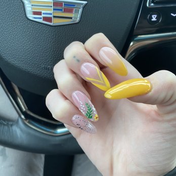 NT Nails and Spa - yellows don't match. Shape is okay. Thickness is okay, on most. - Nail Salons Near Me - Commerce Charter Township, Michigan