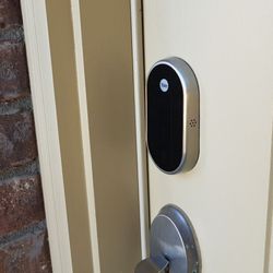 Kouland Technology - Nest door locker for security.