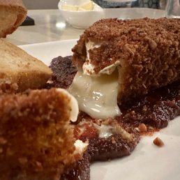 Pecan encrusted Pecan - Crusted Fried Brie Cheese. Outstanding.