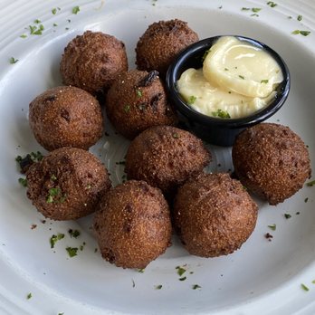 Foster's Kitchen Waikoloa - Hush puppies. - American Near Me - Waikoloa, Hawaii