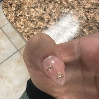 Top Nails - Bleeding cuticle - Nail Salons Near Me - Las Vegas, Nevada