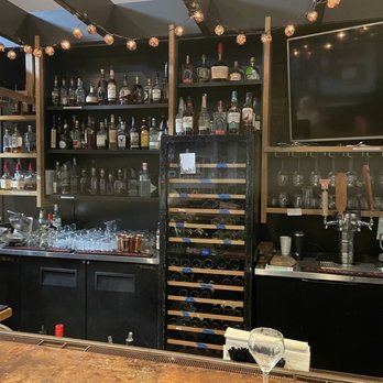 Jean Farris - a bar with wine glasses and bottles - Wineries Near Me - Lexington, Kentucky Jean Farris - a bar with wine glasses and bottles - Wineries Near Me - Lexington, Kentucky