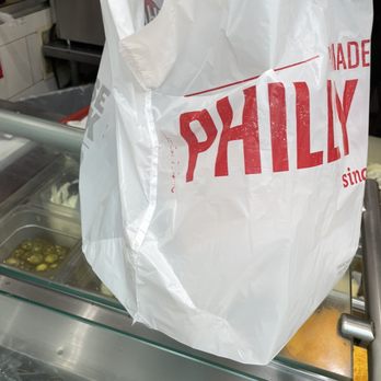 Charleys Cheesesteaks - The order handed over - Sandwiches Near Me - Fresno, California Charleys Cheesesteaks - The order handed over - Sandwiches Near Me - Fresno, California