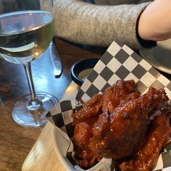 The Belfry - Sauvignon Blanc and duck confit chicken wings - Cocktail Bars Near Me - Kansas City, Missouri The Belfry - Sauvignon Blanc and duck confit chicken wings - Cocktail Bars Near Me - Kansas City, Missouri
