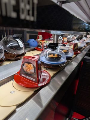 Kura Revolving Sushi Bar by null