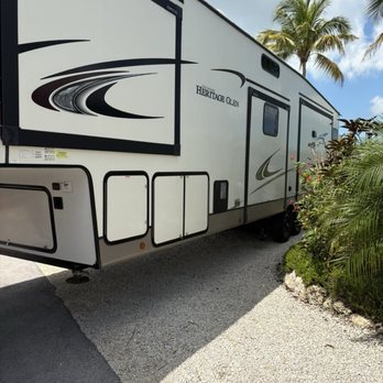 Rolling Oasis Rentals - Outside before slide outs were extended. - RV Rental Near Me - Big Pine Key, Florida