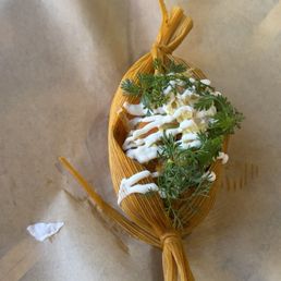 Chuchito/tamal Chuchito/tamal