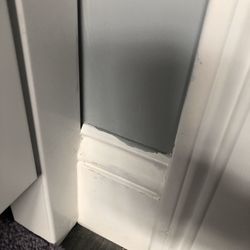 Bobby Allen Painting - Gray paint on white trim. Also note nail holes