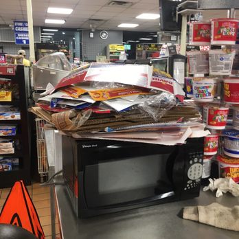 TA Denton - Broken down boxes stacked on the counter - Service Stations Near Me - Denton, Texas