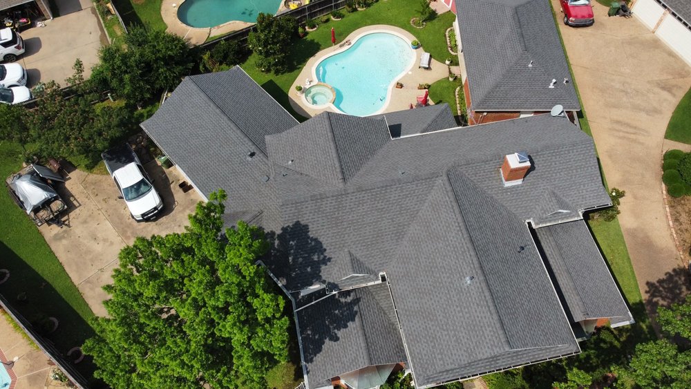 Slide of Uptown Roofing & Co