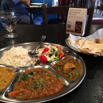 India Bistro - The "special" dish recommended to me. You can see the right two curries were pretty oily. The one on the left was good. - Indian Near Me - Vancouver, British Columbia India Bistro - The "special" dish recommended to me. You can see the right two curries were pretty oily. The one on the left was good. - Indian Near Me - Vancouver, British Columbia