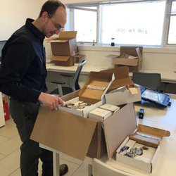 Priority Energy - Dave is unpacking Indoor Air Quality gauges and testing kits for his IAQ assessments.