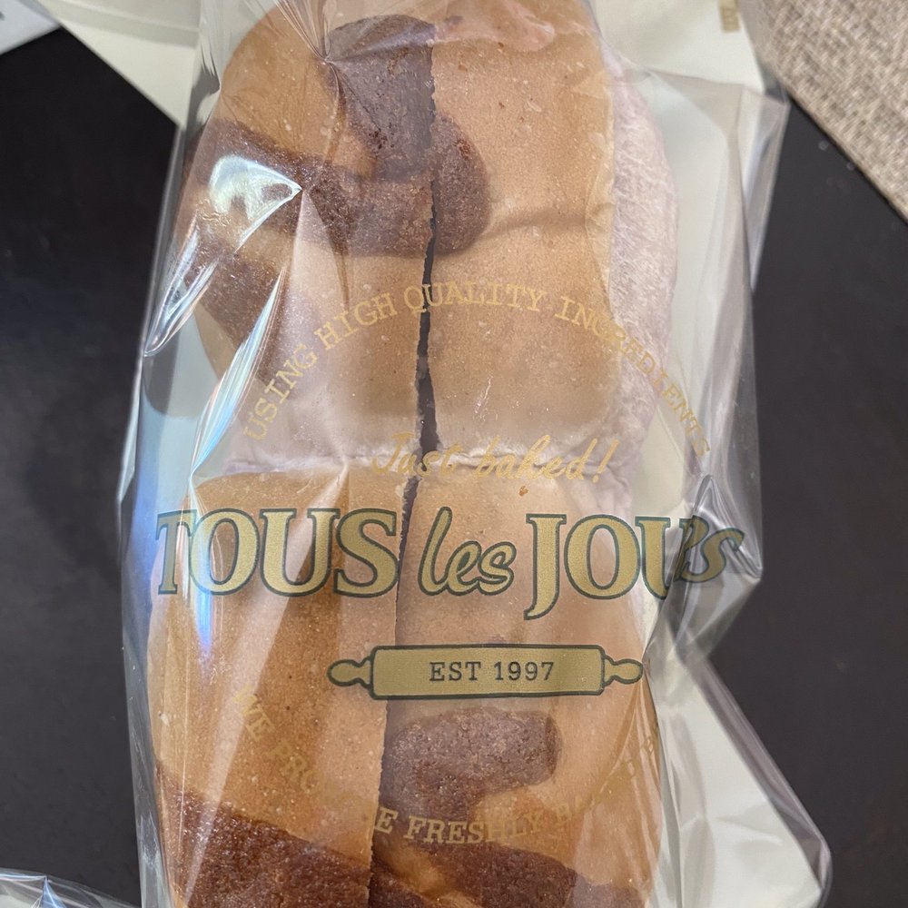 Tous Les Jours - Taro bread with cream filling - Bakeries Near Me - Beaverton, Oregon Tous Les Jours - Taro bread with cream filling - Bakeries Near Me - Beaverton, Oregon